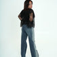 Jeans glitterato nei lati