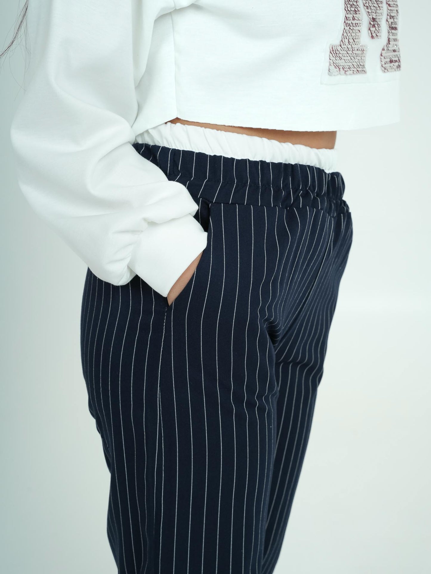 Pantaloni classici con elastico bianco